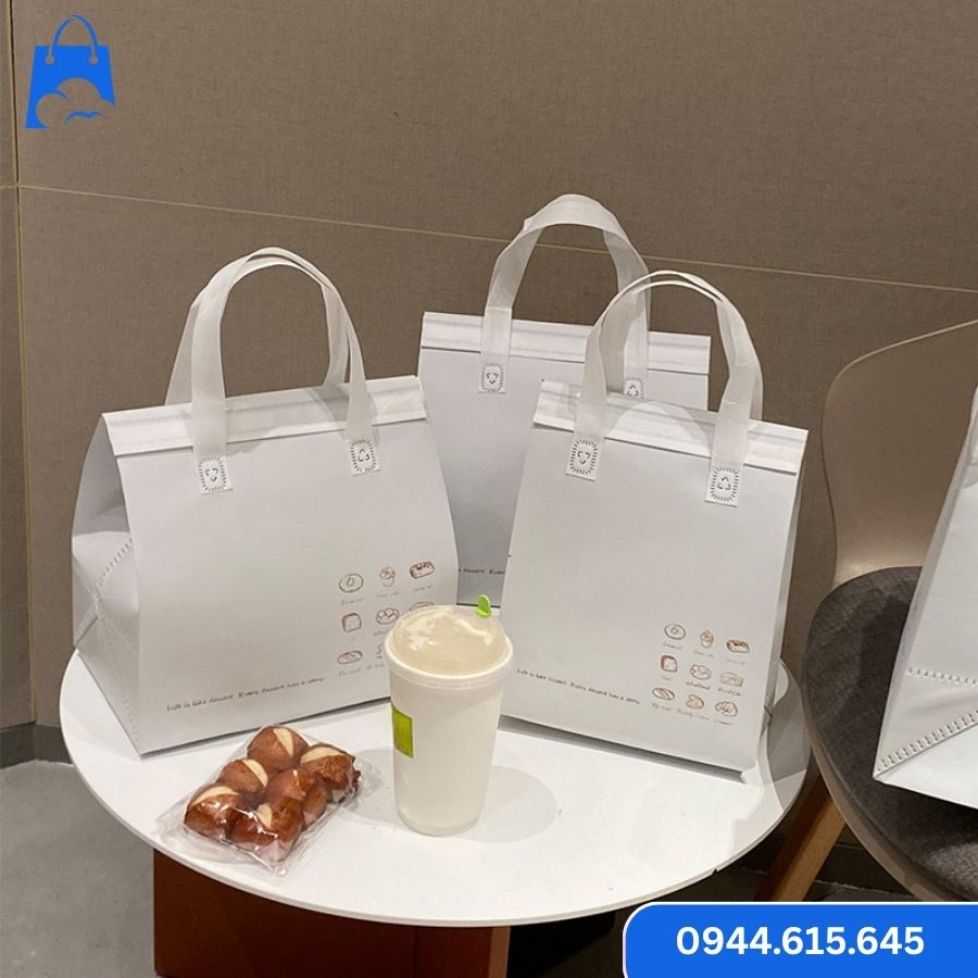 Túi giữ nhiệt trà sữa đẹp màu trắng – đựng combo bánh và nước tiện lợi, phù hợp cho quán cafe take-away.