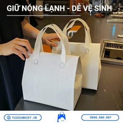Túi giữ nhiệt trà sữa mùa hè 2026 màu trắng với thiết kế quai xách chắc chắn, giữ nóng lạnh hiệu quả và dễ dàng vệ sinh sau khi sử dụng.